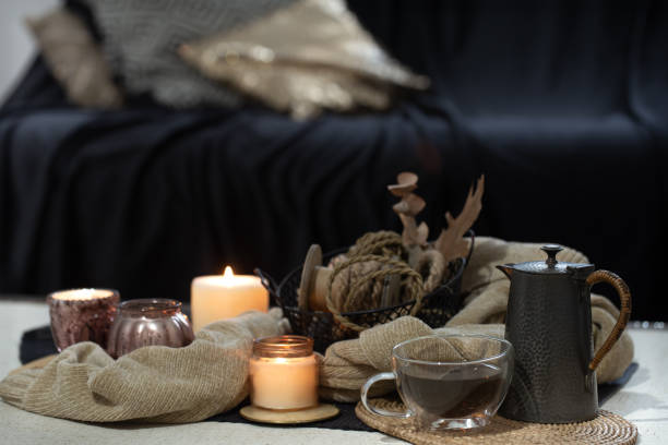 Soft candlelight and linen textiles in a calm evening setting